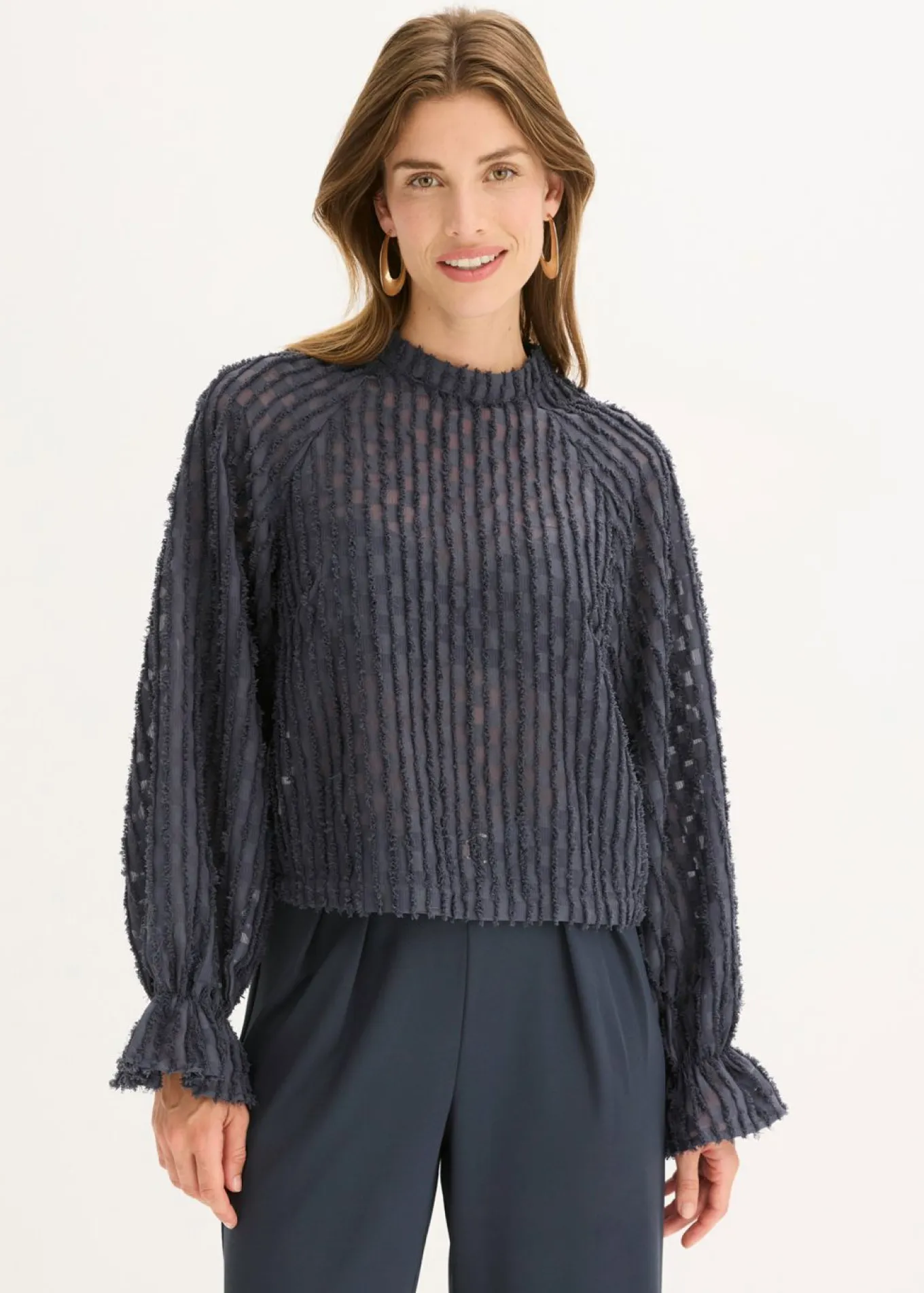 Blusa de material estructurado