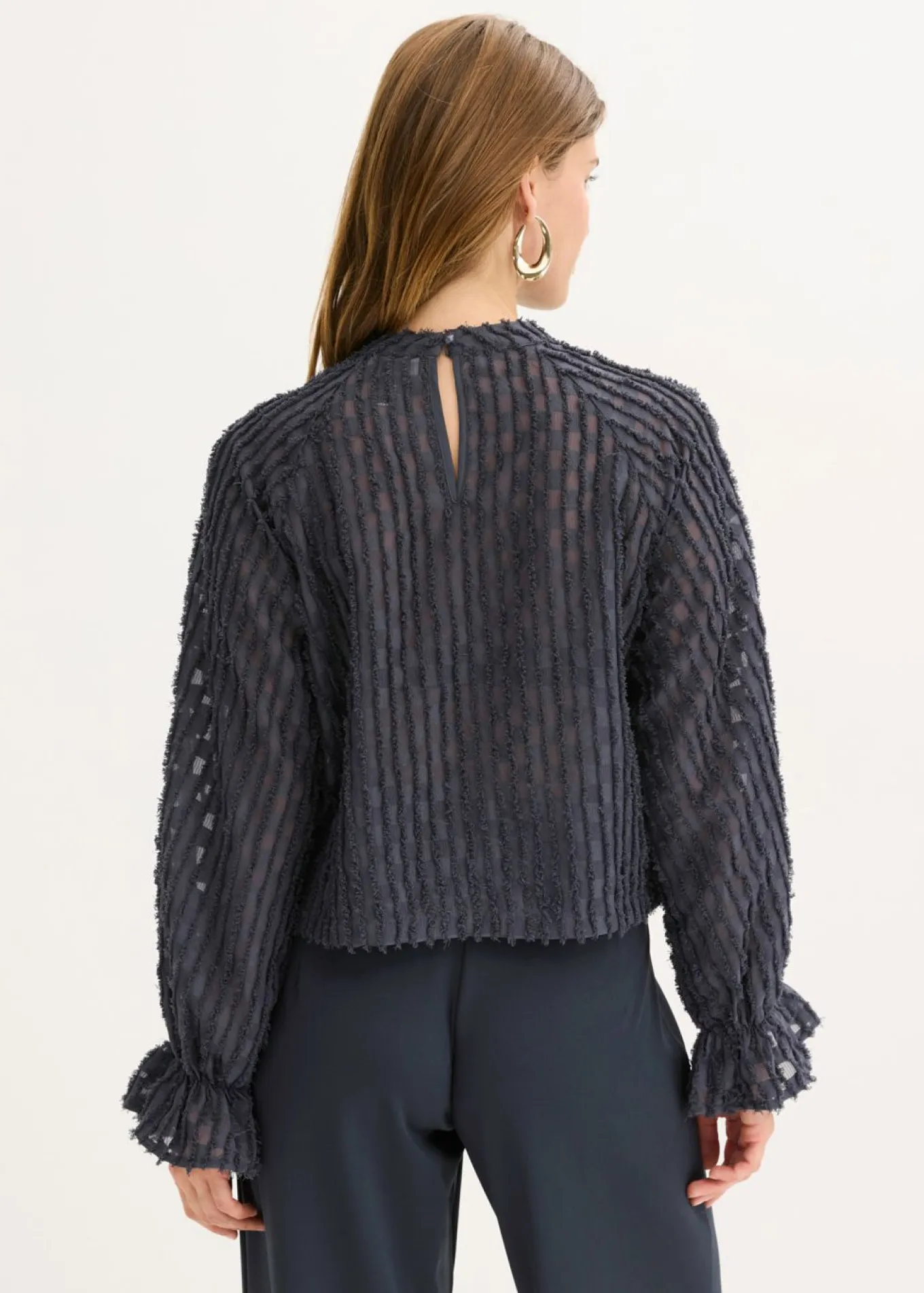 Blusa de material estructurado