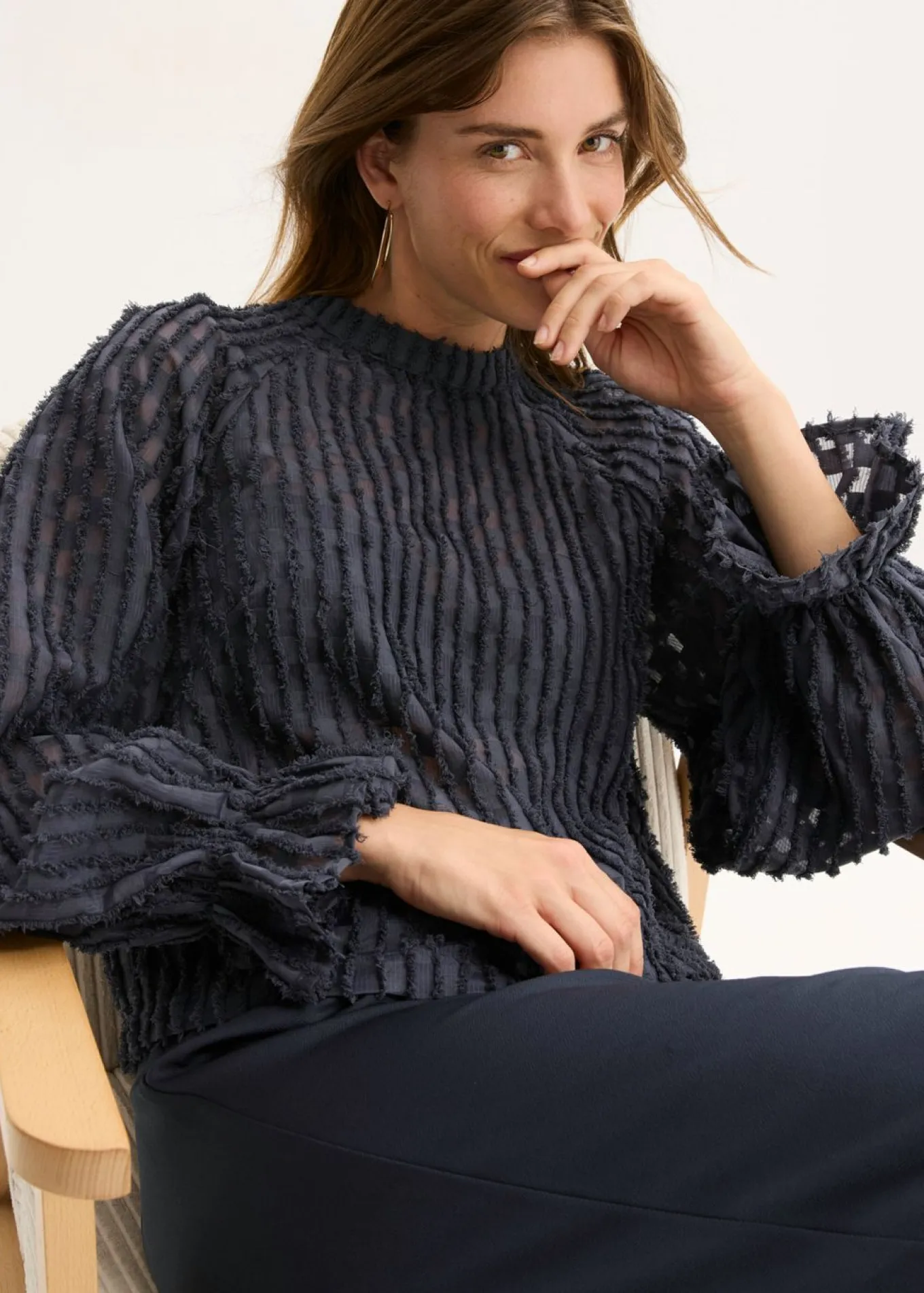 Blusa de material estructurado