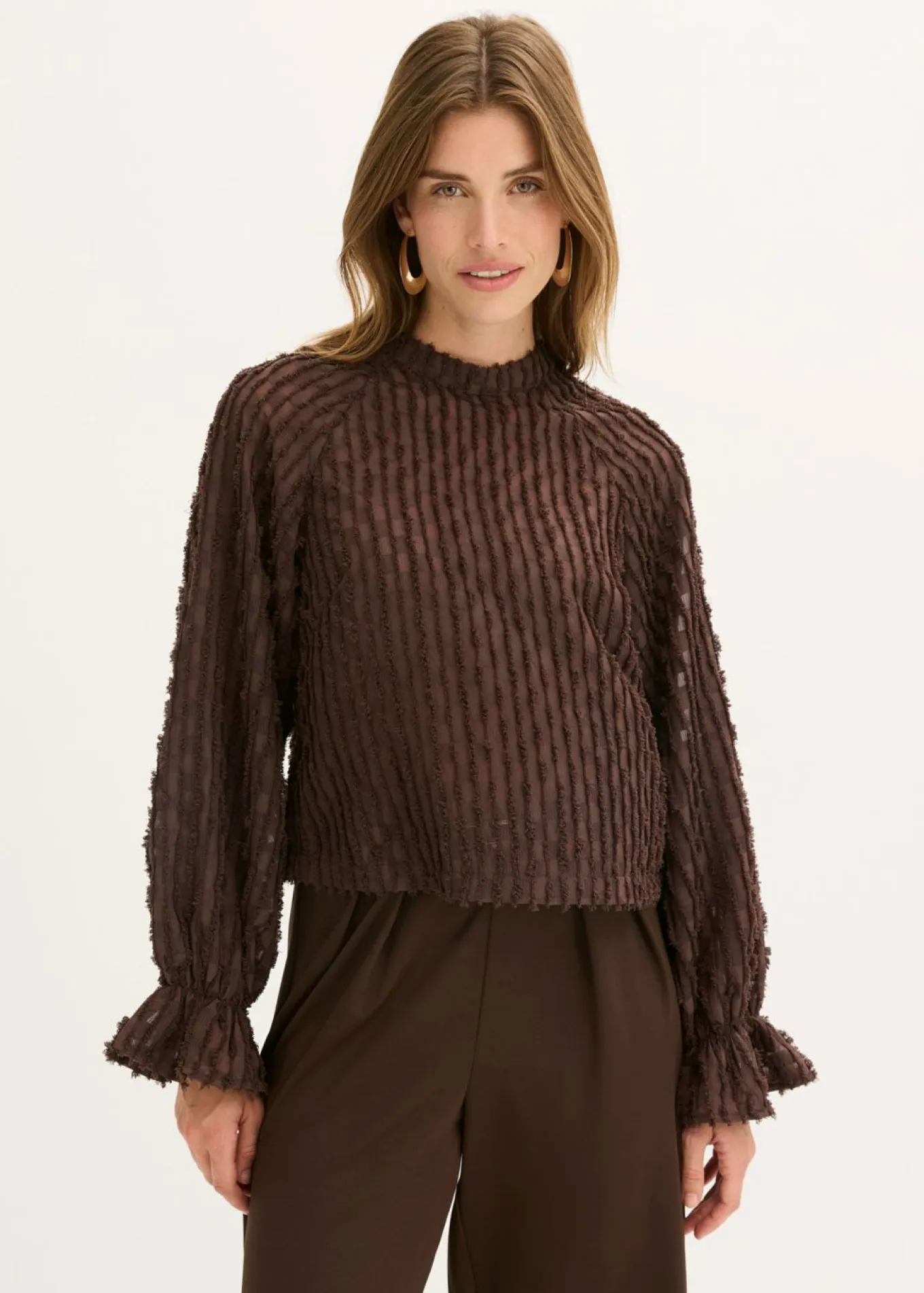 Blusa de material estructurado