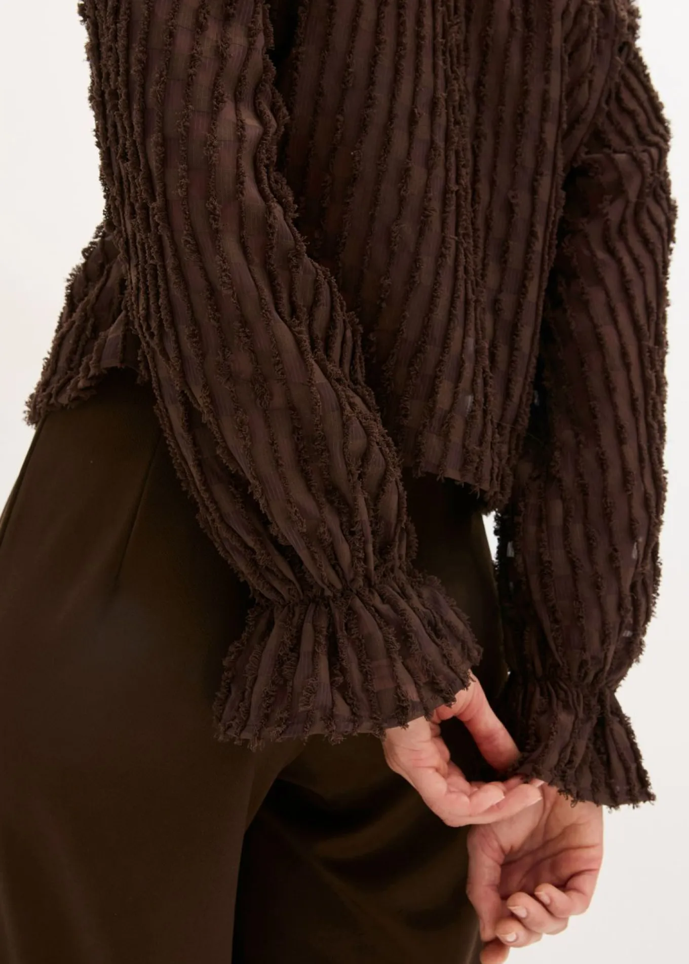 Blusa de material estructurado