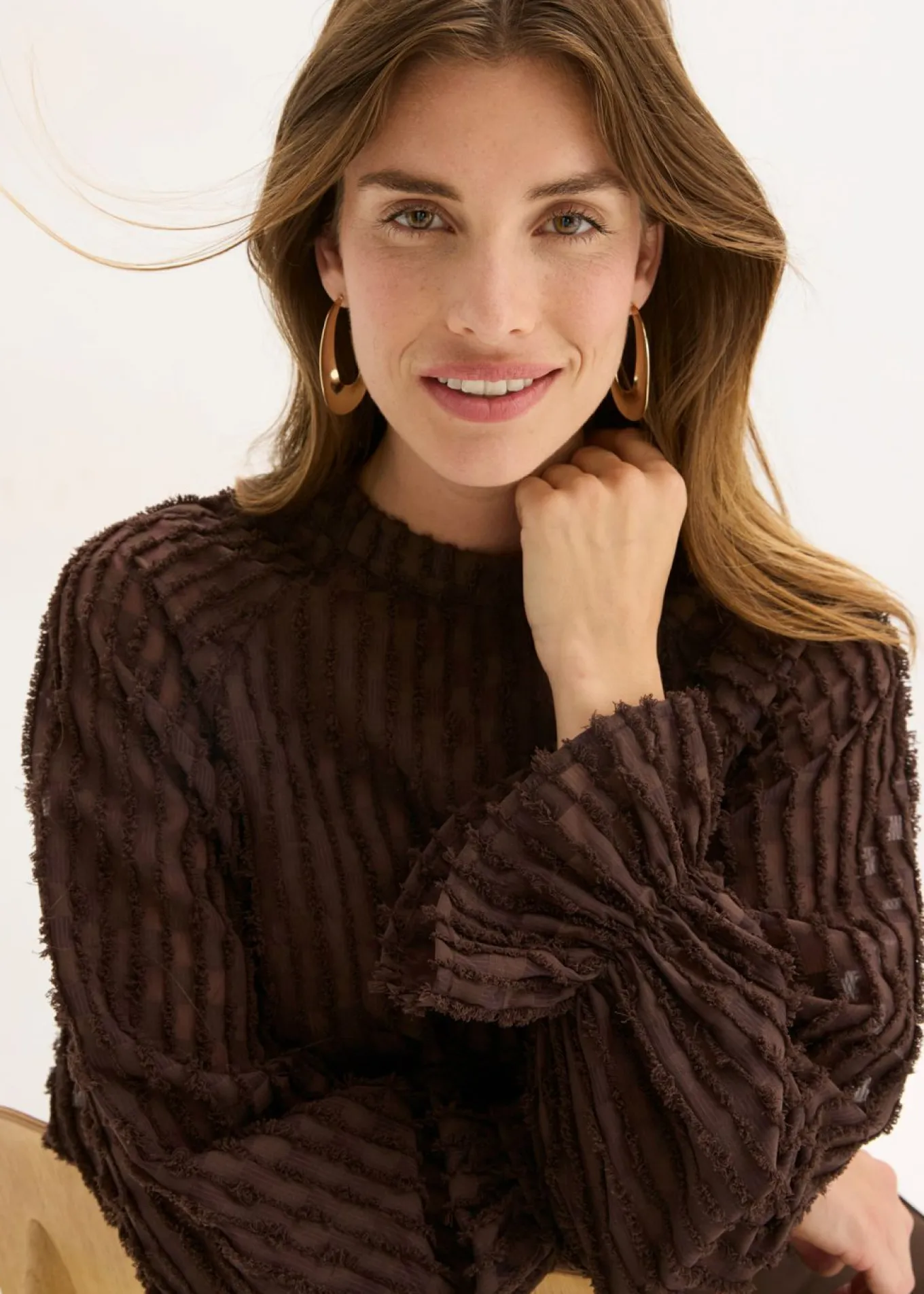 Blusa de material estructurado