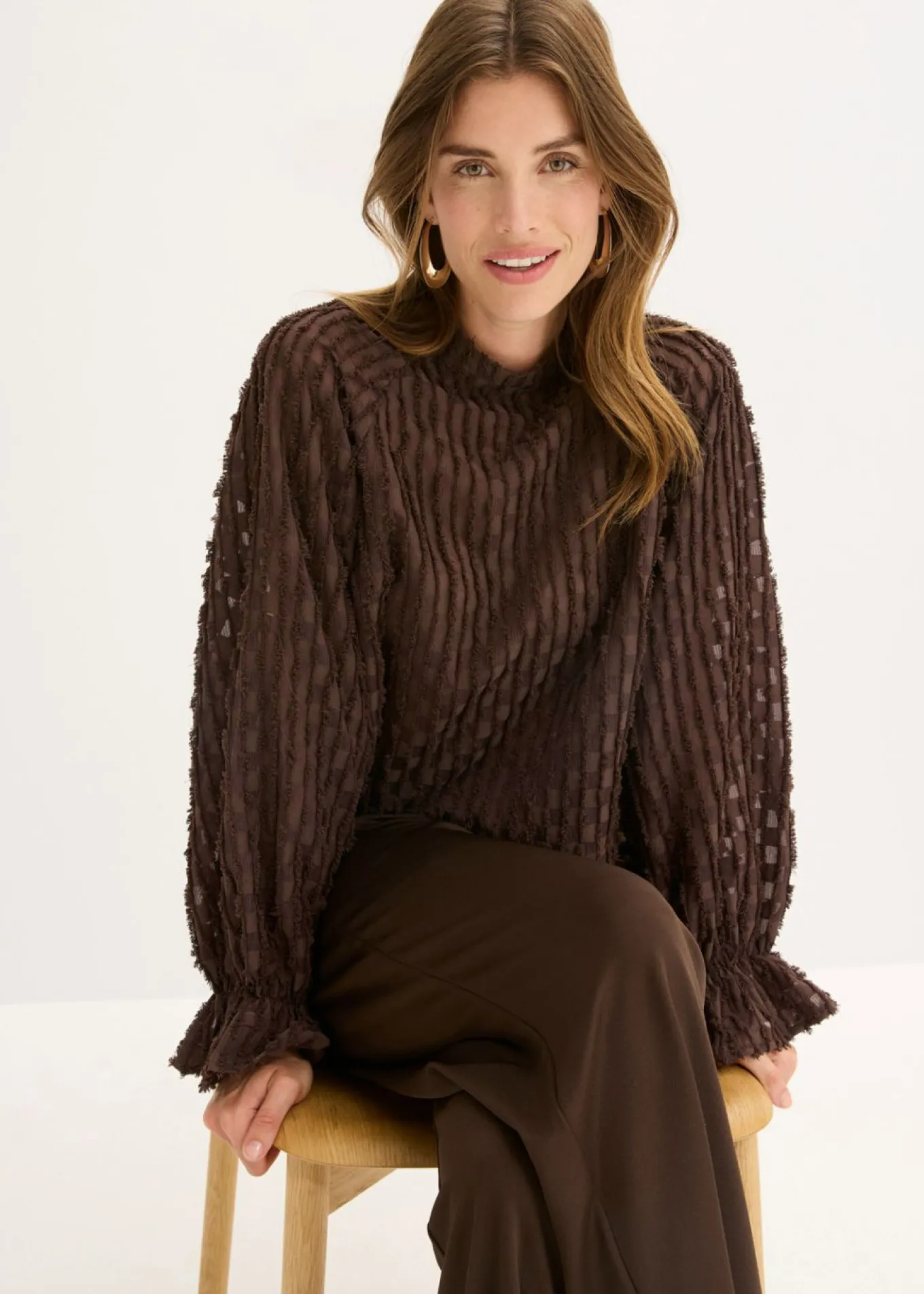Blusa de material estructurado