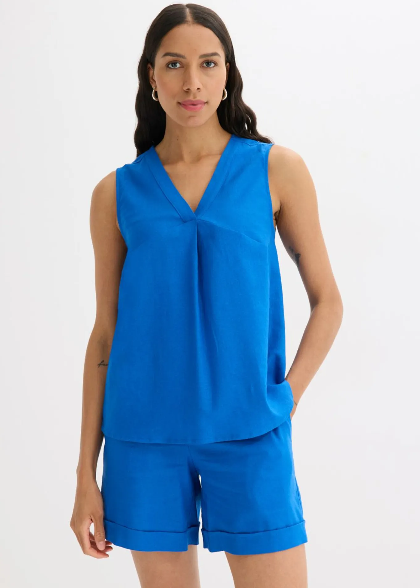 Blusa de mezcla de lino vaporoso