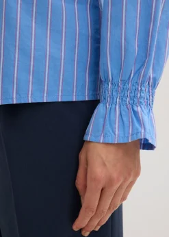 Blusa de popelín con volantes en el cuello
