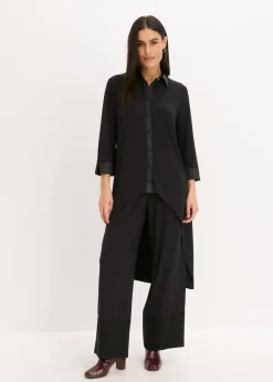 Blusa de punto con ribetes de satén
