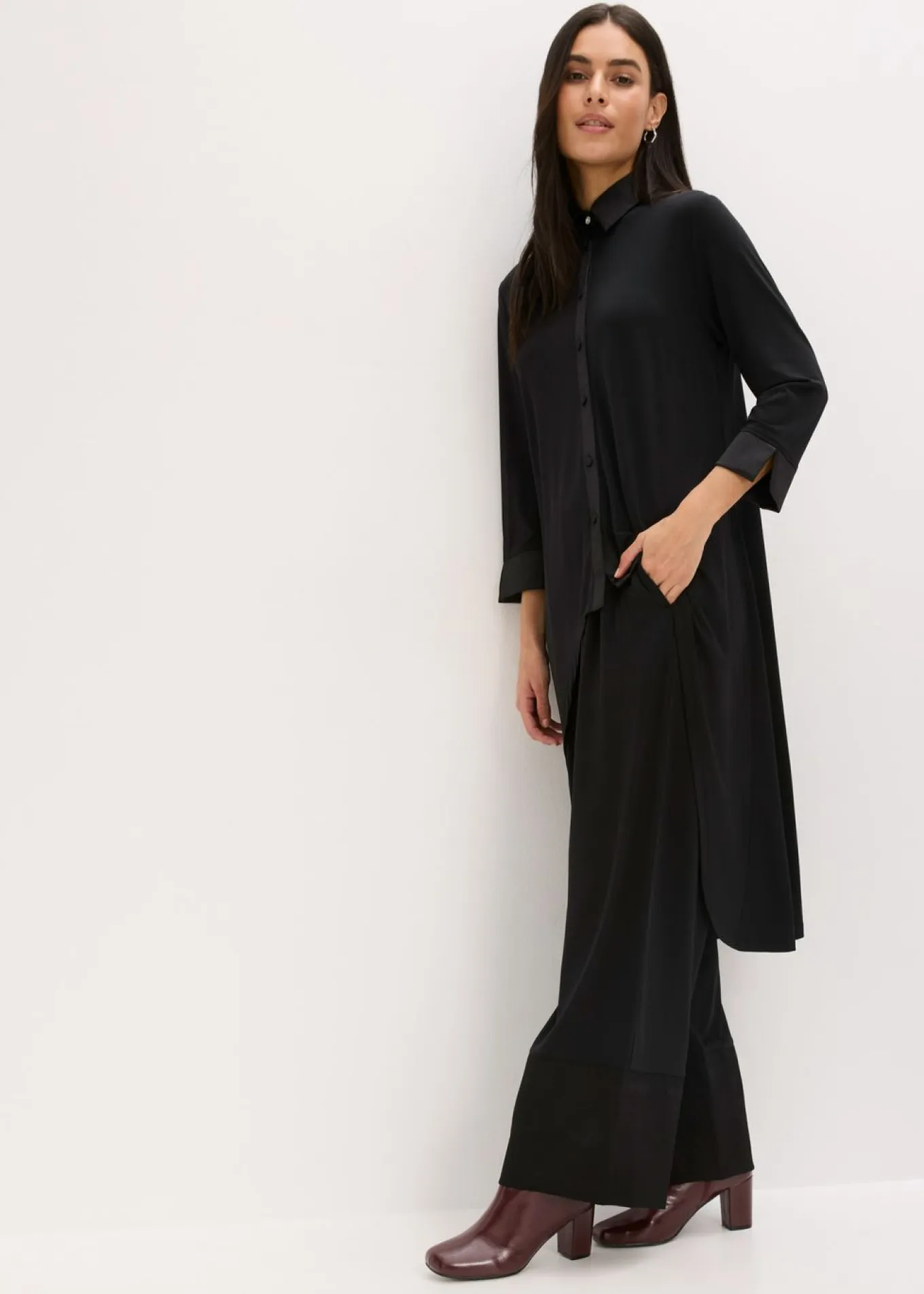Blusa de punto con ribetes de satén