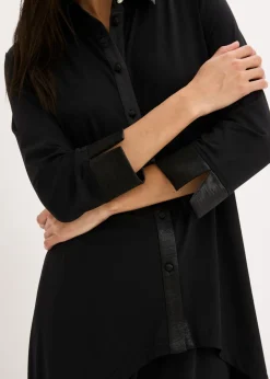 Blusa de punto con ribetes de satén
