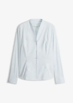 Blusa elástica de popelín con cuello chimenea y ligera transparencia