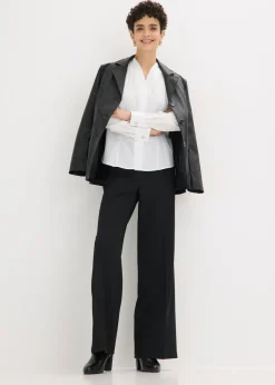 Blusa elástica de popelín con cuello chimenea y ligera transparencia