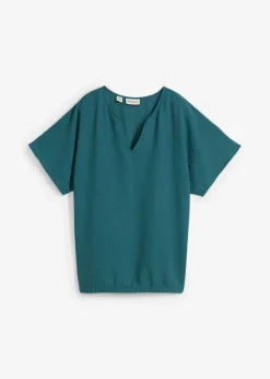 Blusa holgada con dobladillo elástico