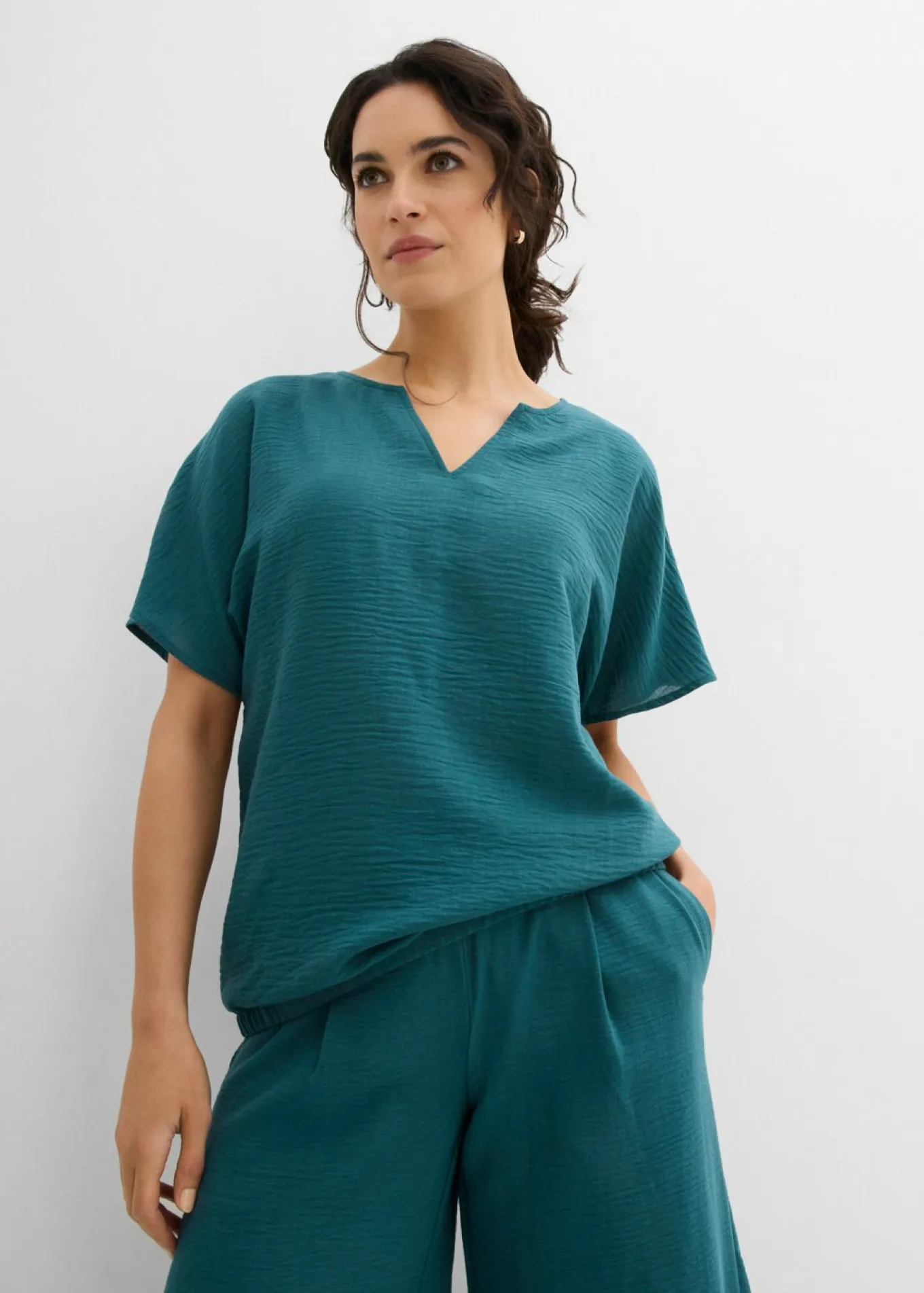 Blusa holgada con dobladillo elástico