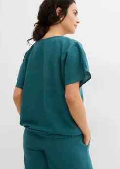 Blusa holgada con dobladillo elástico