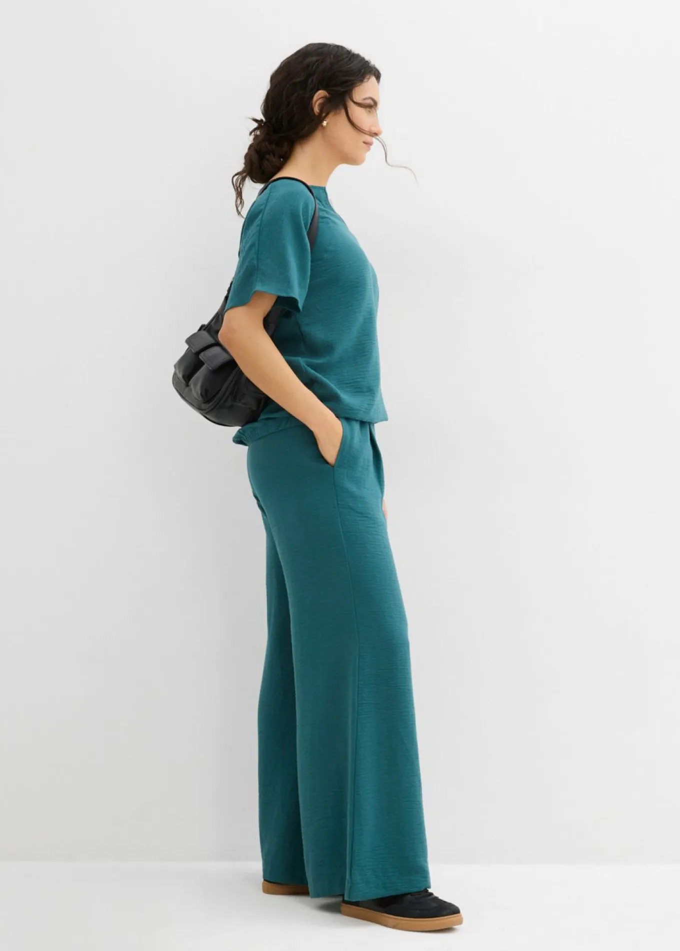 Blusa holgada con dobladillo elástico