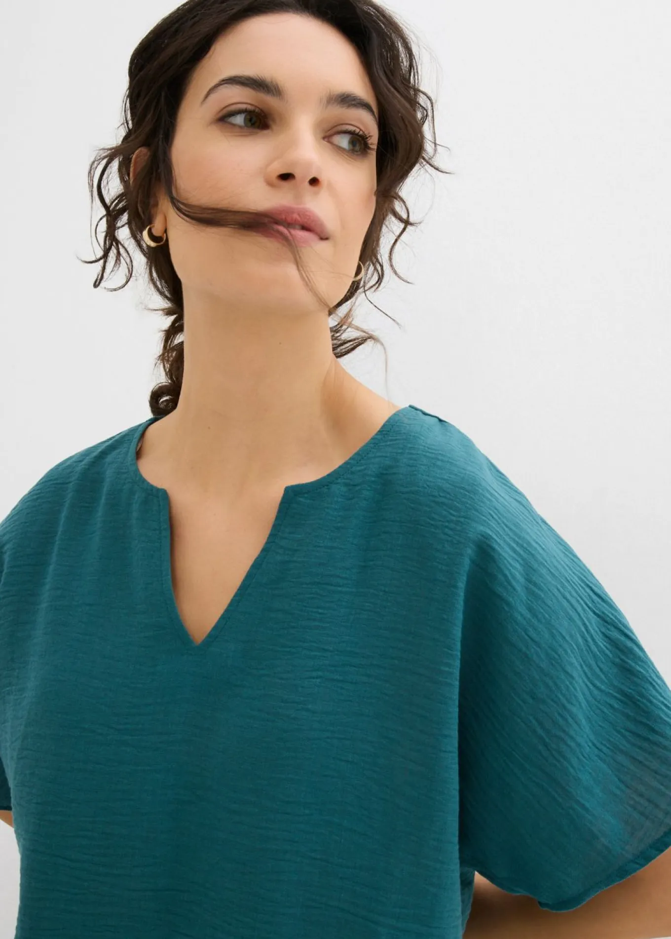 Blusa holgada con dobladillo elástico