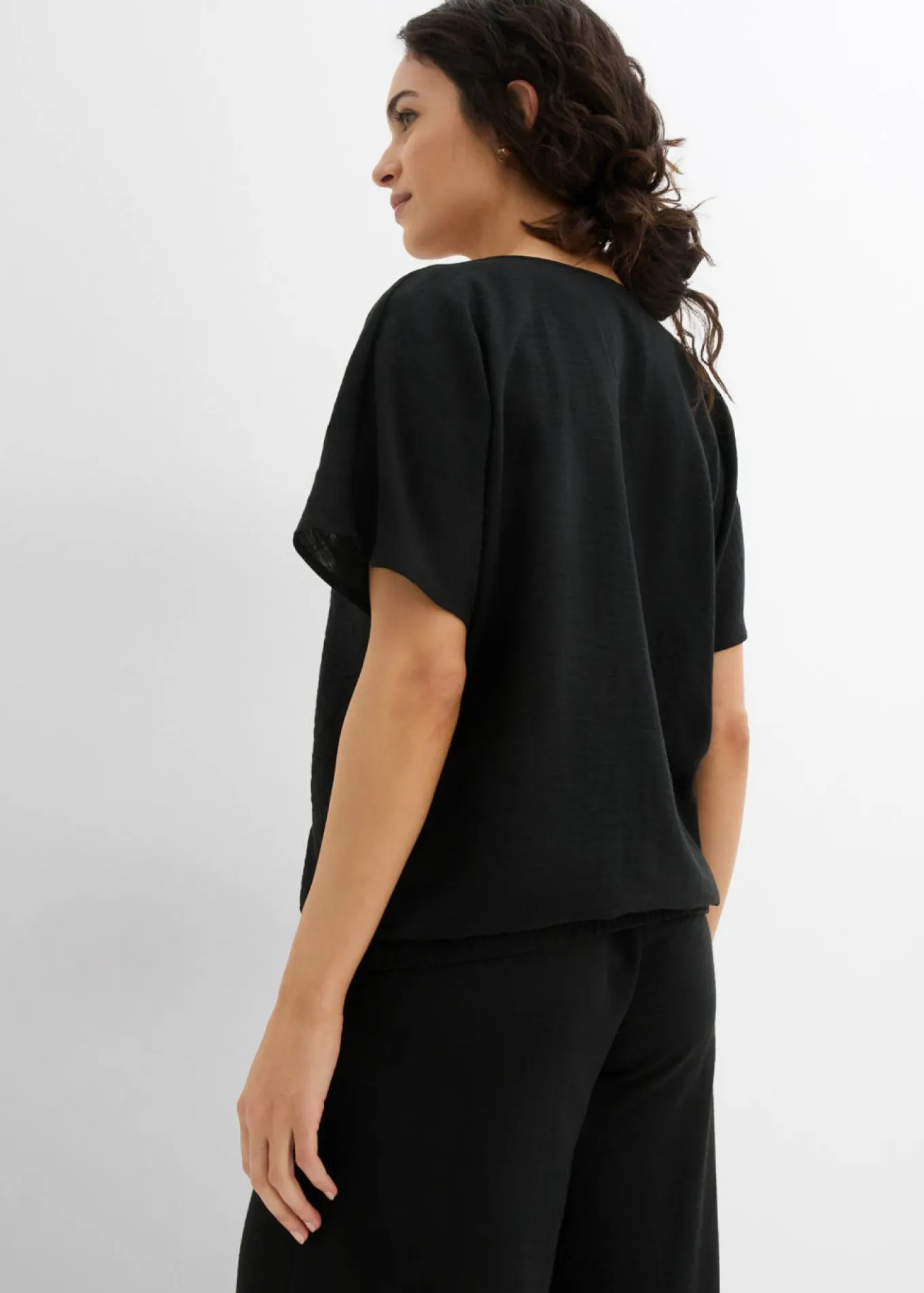 Blusa holgada con dobladillo elástico