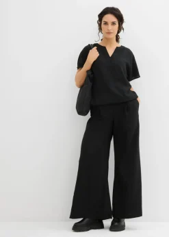 Blusa holgada con dobladillo elástico