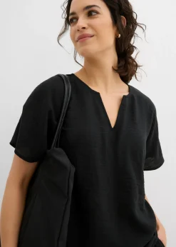 Blusa holgada con dobladillo elástico
