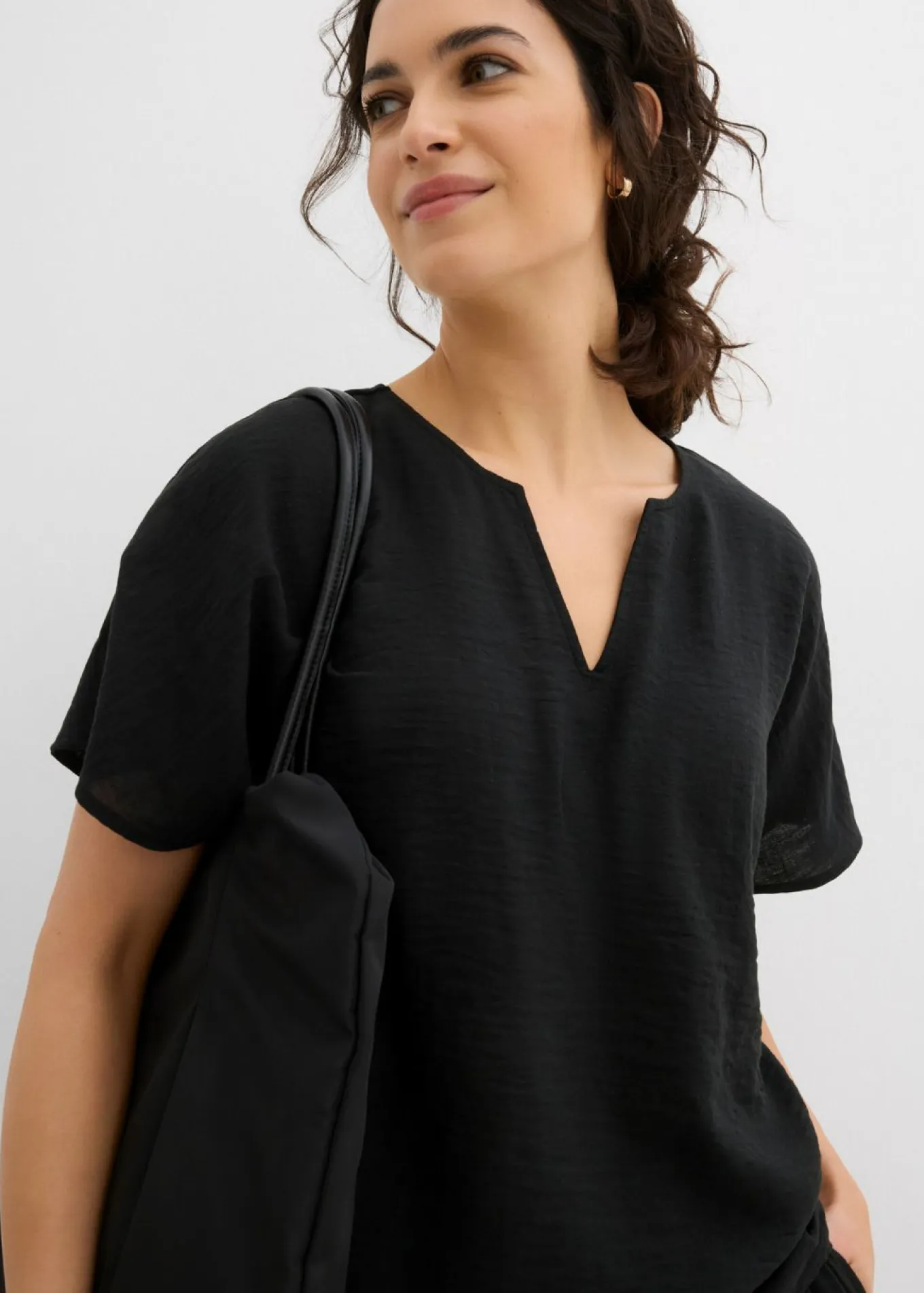 Blusa holgada con dobladillo elástico