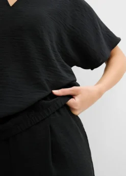 Blusa holgada con dobladillo elástico