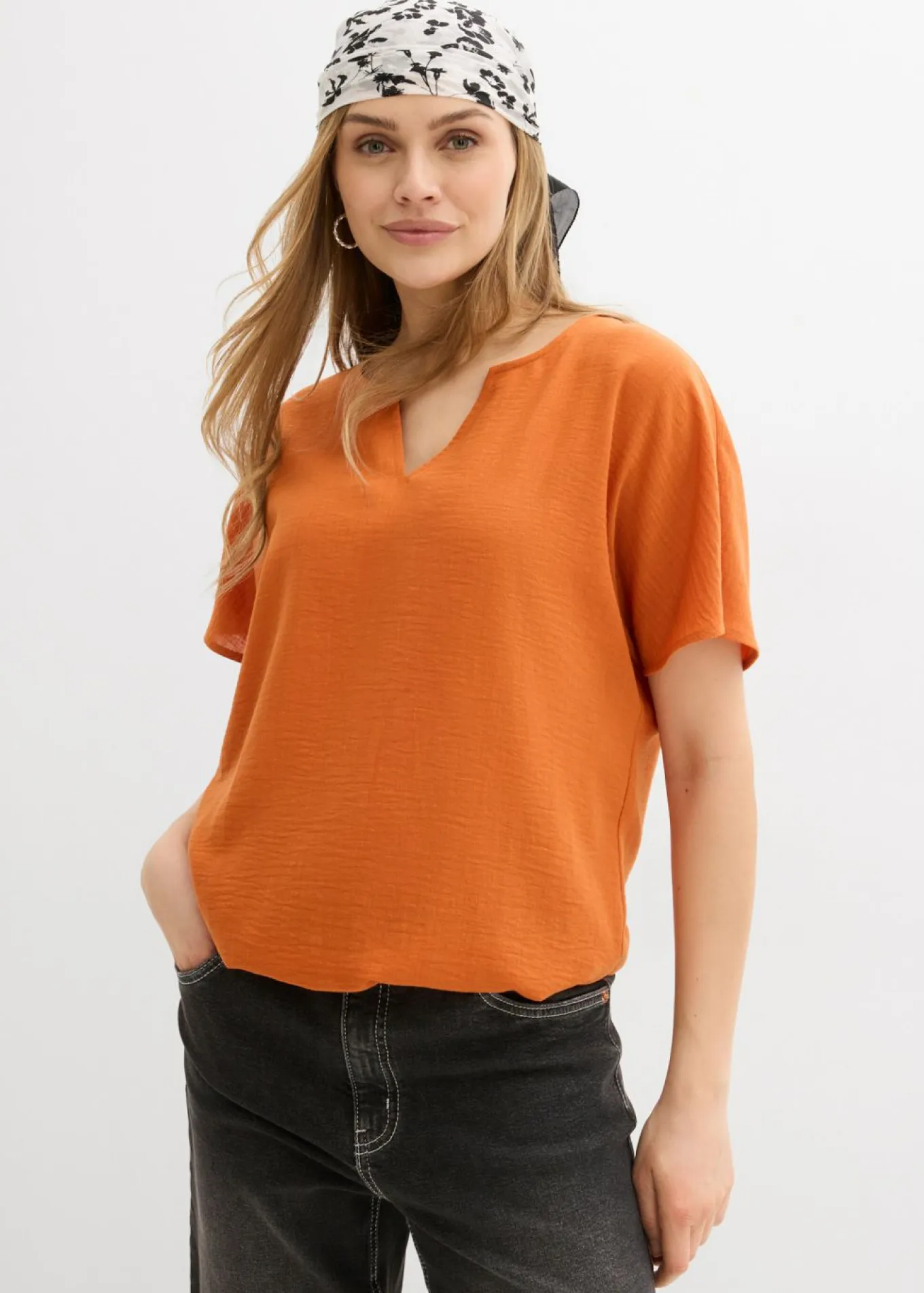 Blusa holgada con dobladillo elástico