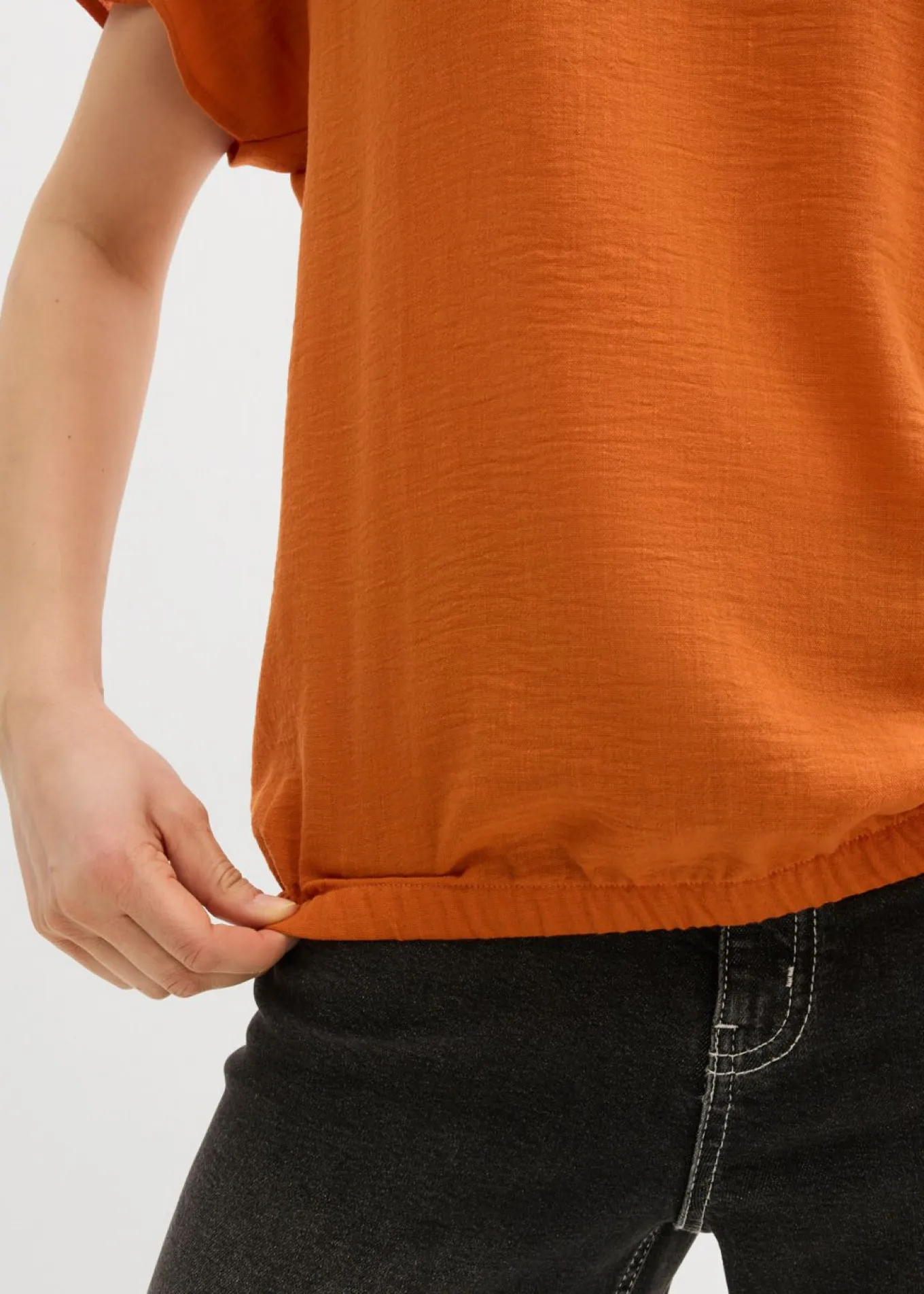 Blusa holgada con dobladillo elástico