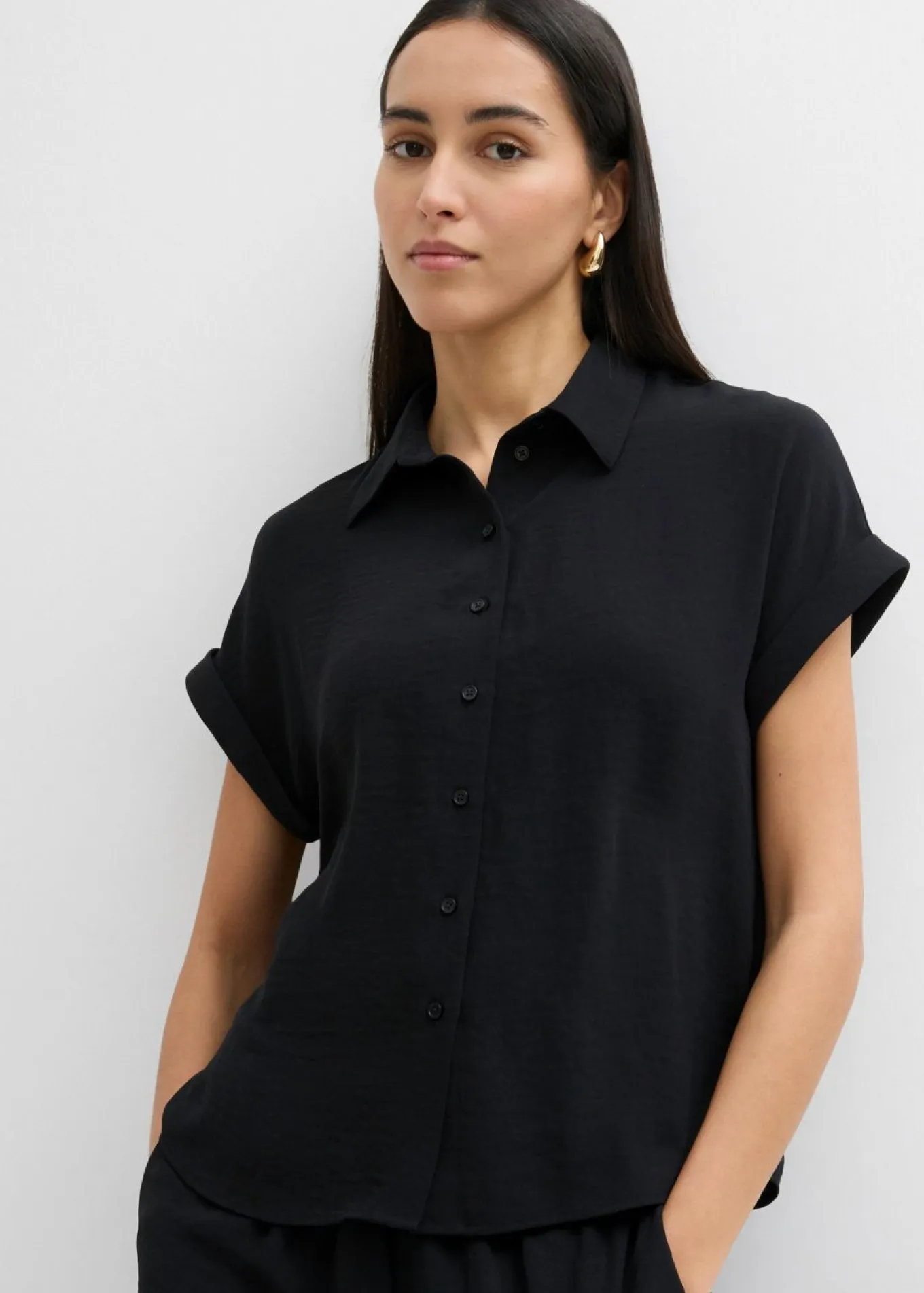 Blusa holgada de crepé estructurado