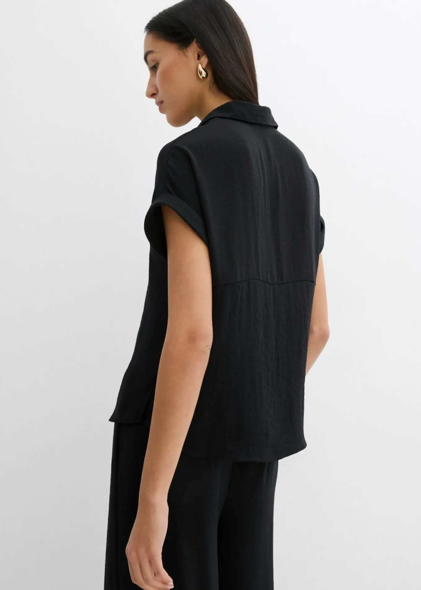 Blusa holgada de crepé estructurado