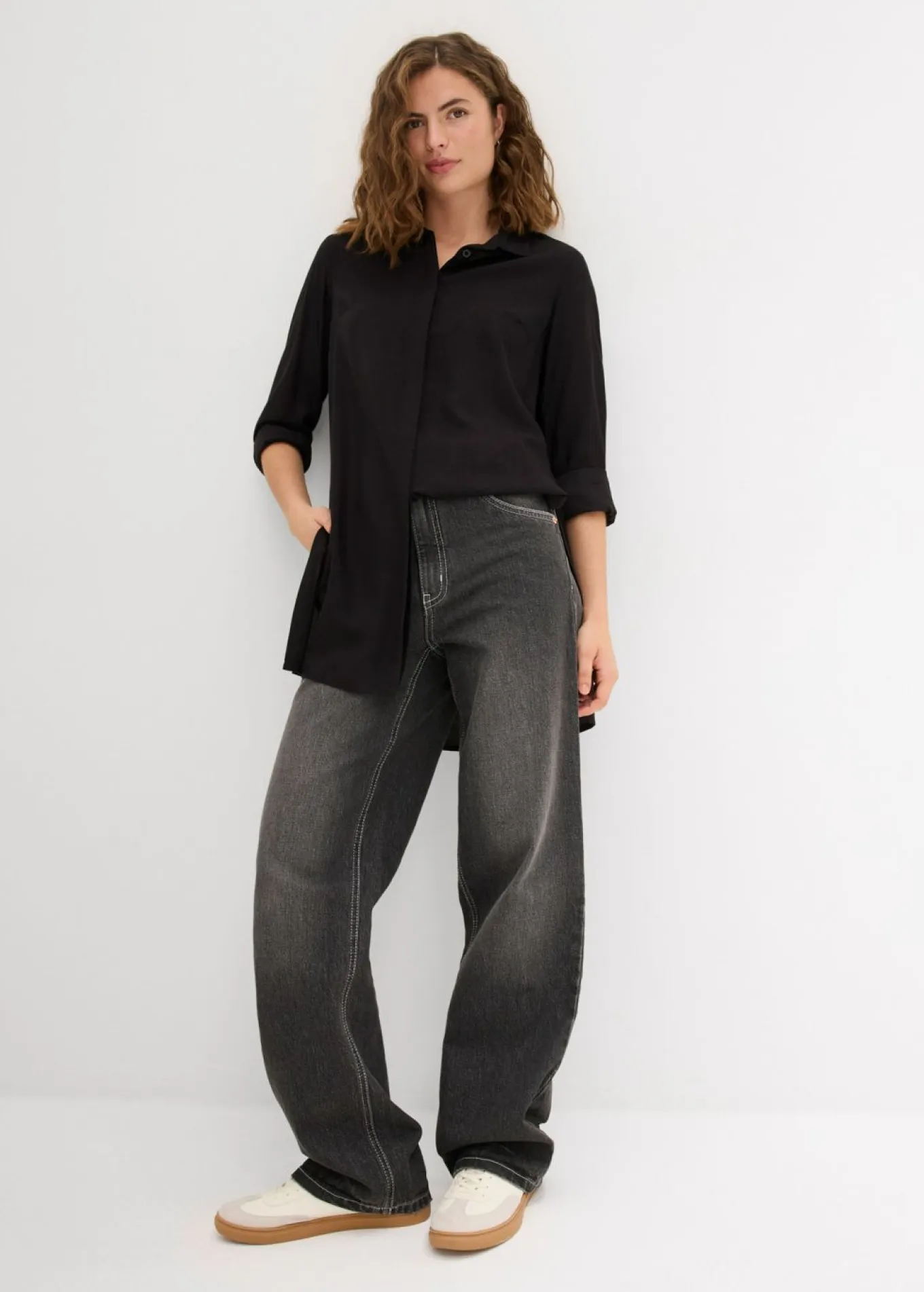 Blusa larga con abertura de viscosa fluida