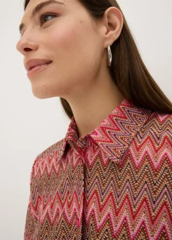 Blusa larga con aspecto de ganchillo