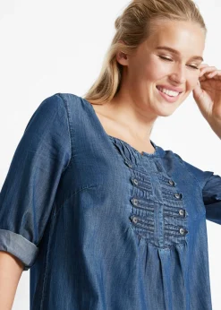 Blusa larga con corte en A