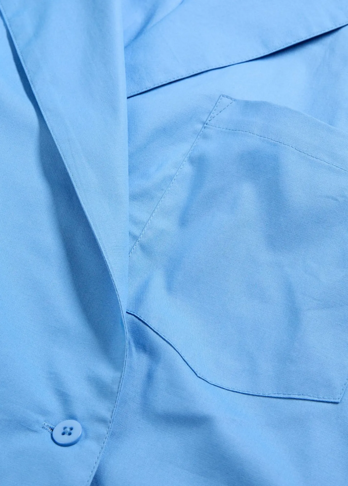 Blusa larga con escote en V