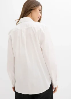 Blusa larga con escote en V