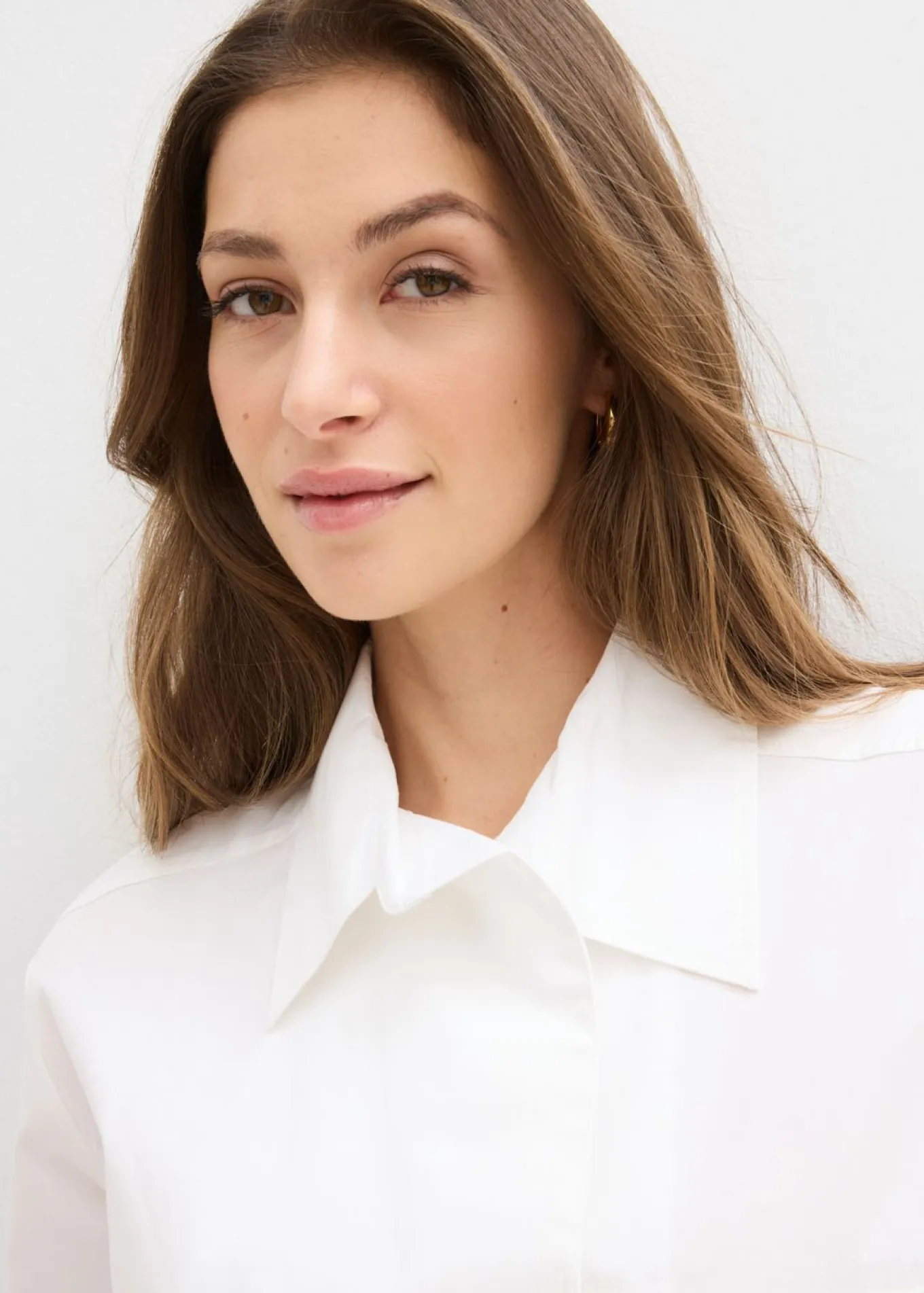 Blusa larga con escote en V