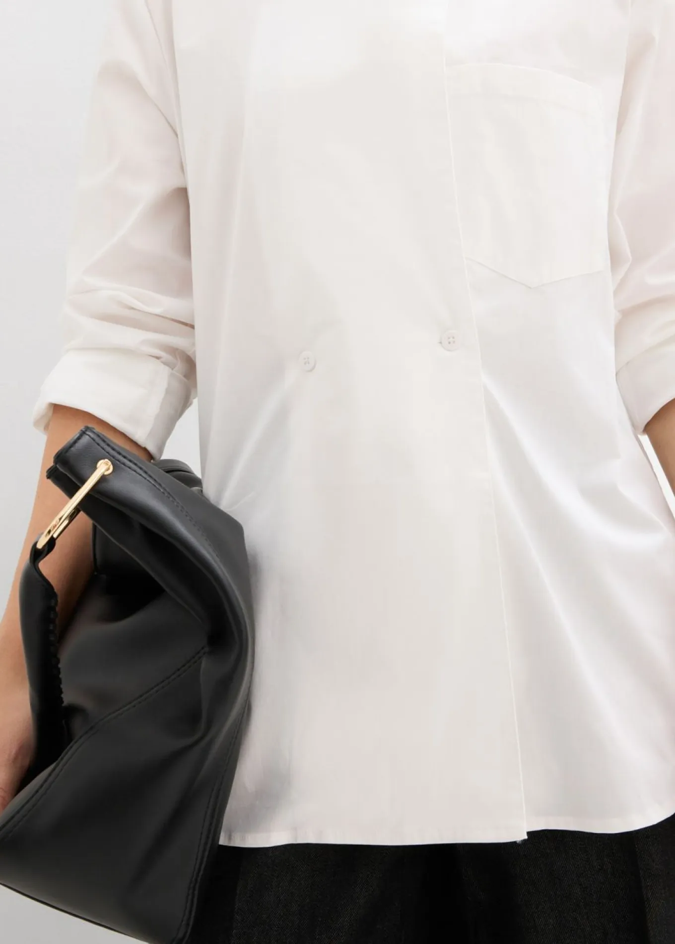 Blusa larga con escote en V