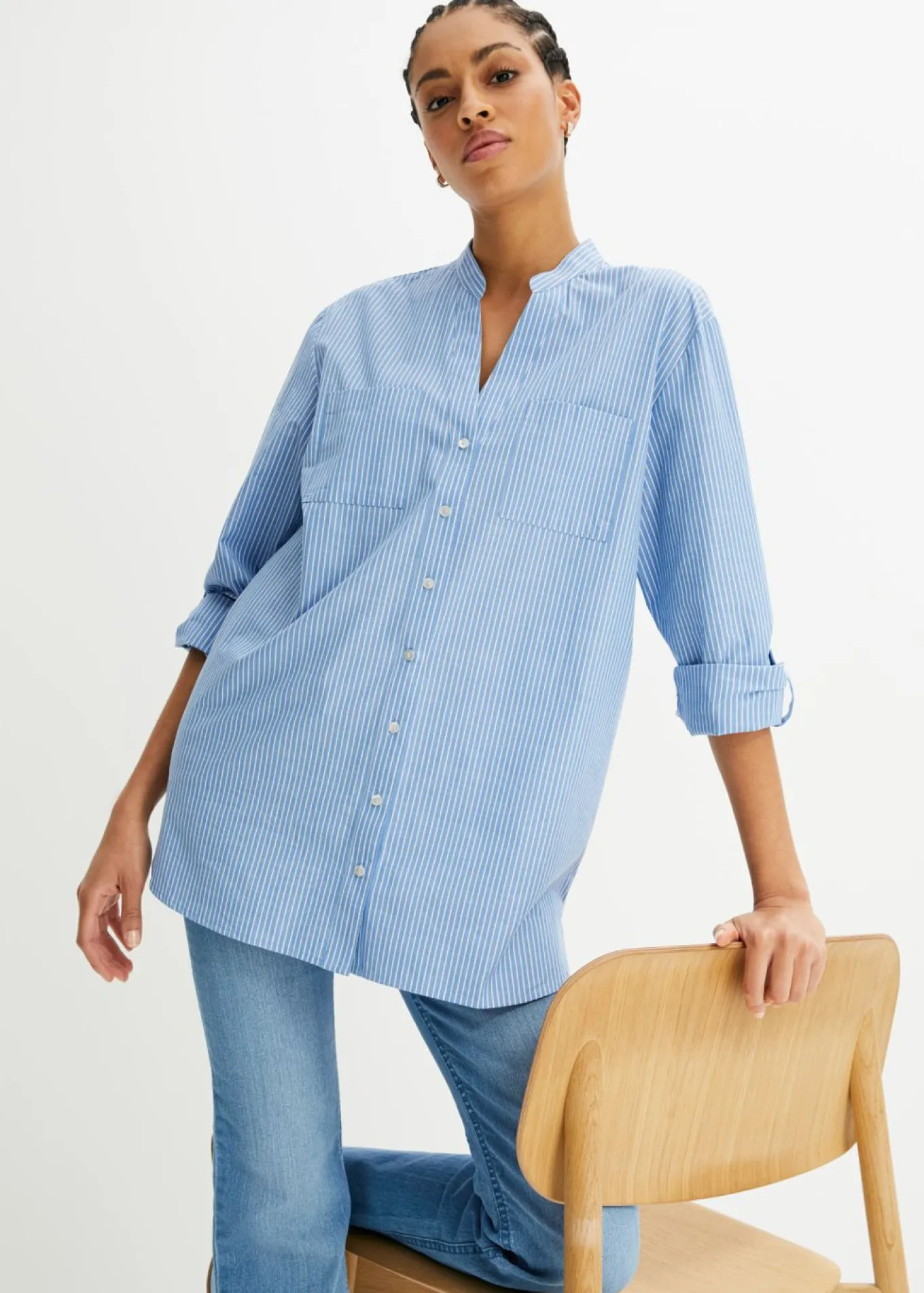 Blusa larga con mangas remangables