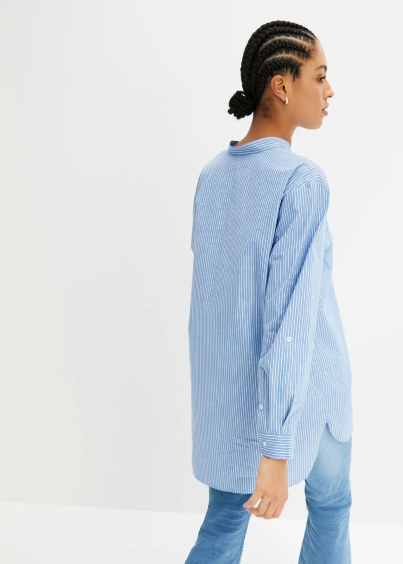 Blusa larga con mangas remangables