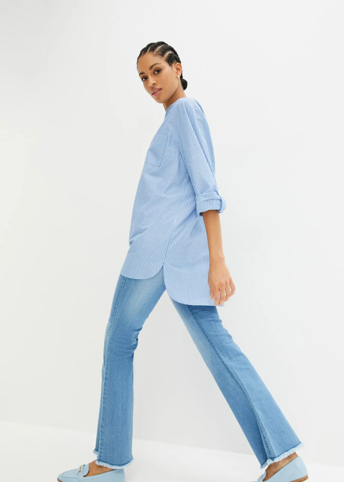 Blusa larga con mangas remangables