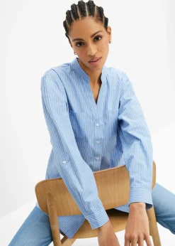 Blusa larga con mangas remangables