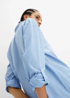 Blusa larga con mangas remangables