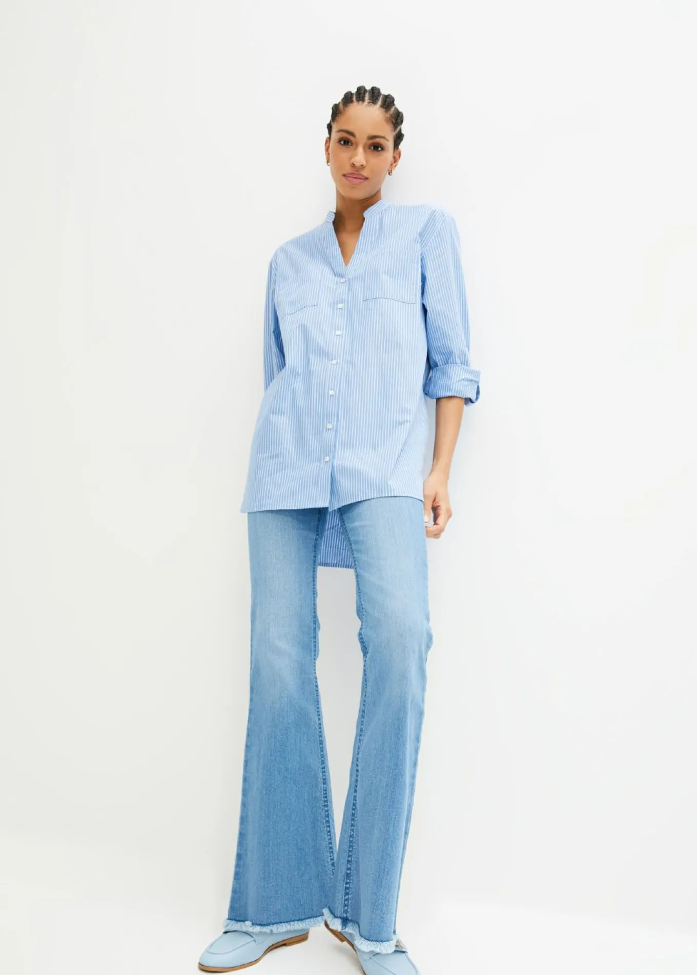 Blusa larga con mangas remangables