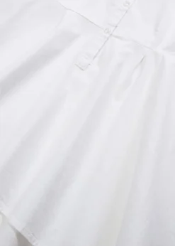 Blusa larga con volante