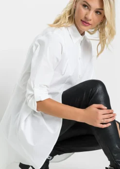 Blusa larga con volante