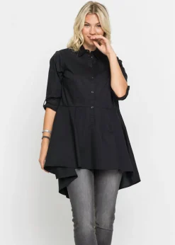 Blusa larga con volante