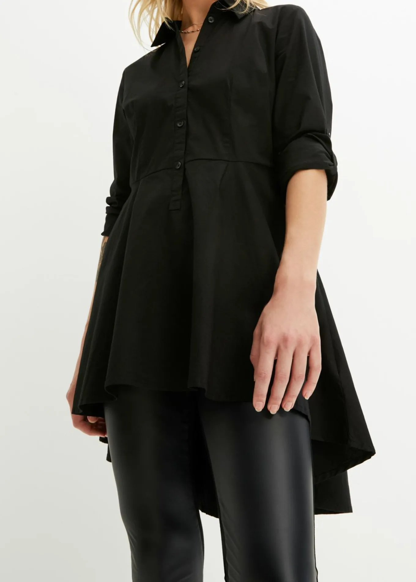 Blusa larga con volante