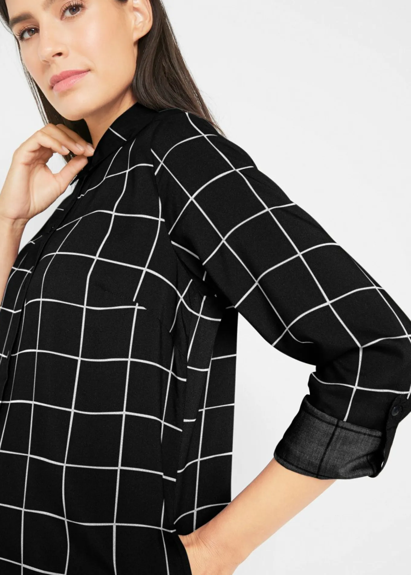 Blusa larga de cuadros con bolsillos