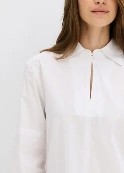 Blusa oversize con mangas voluminosas
