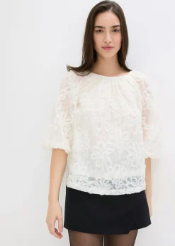 Blusa sin cierre con estampado floral texturizado