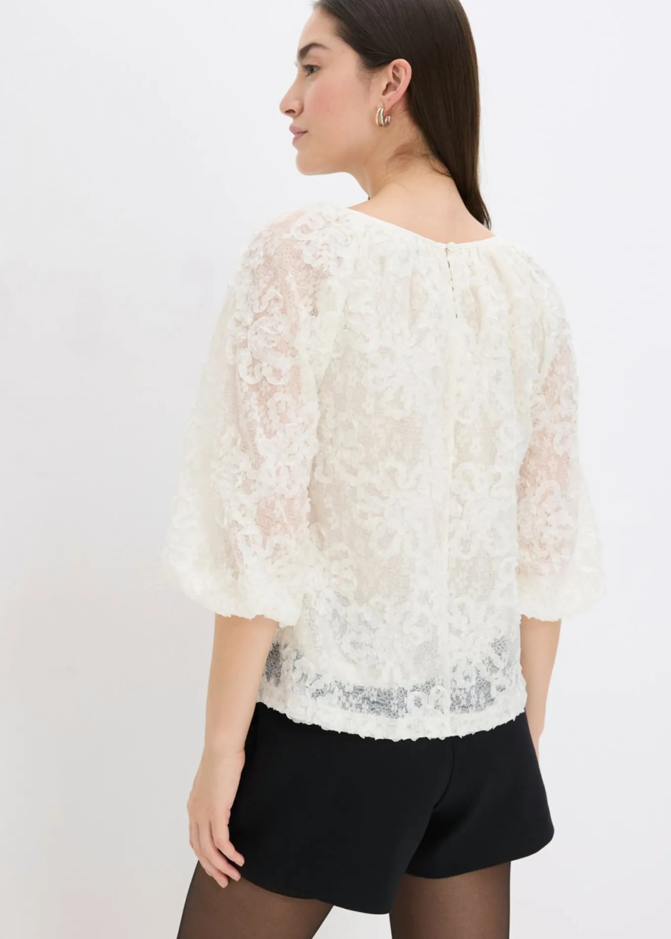 Blusa sin cierre con estampado floral texturizado