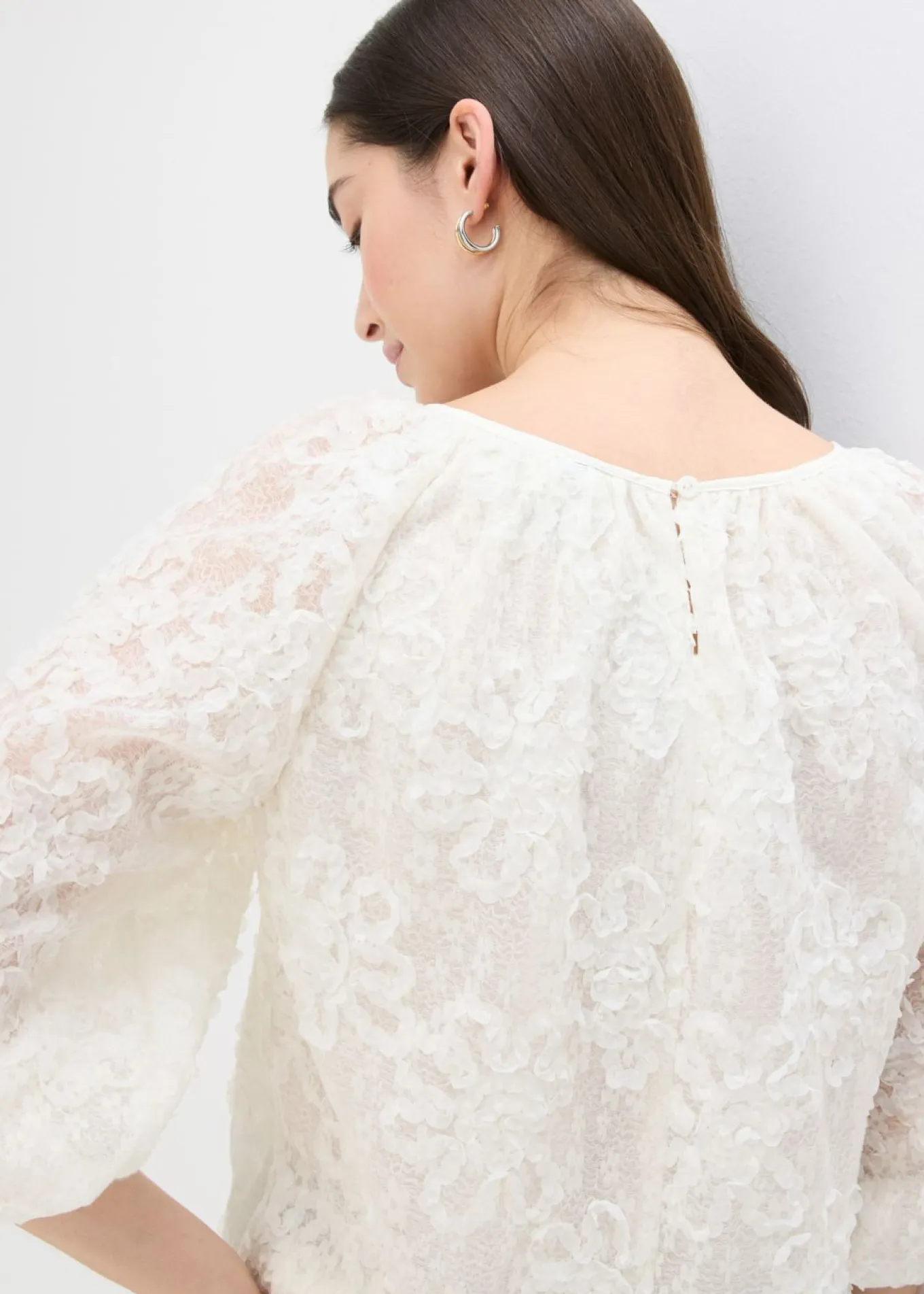 Blusa sin cierre con estampado floral texturizado